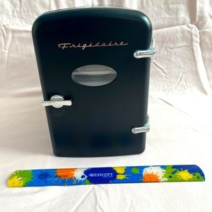 Averaged sized skin care fridge, functioning, can be used for drinks